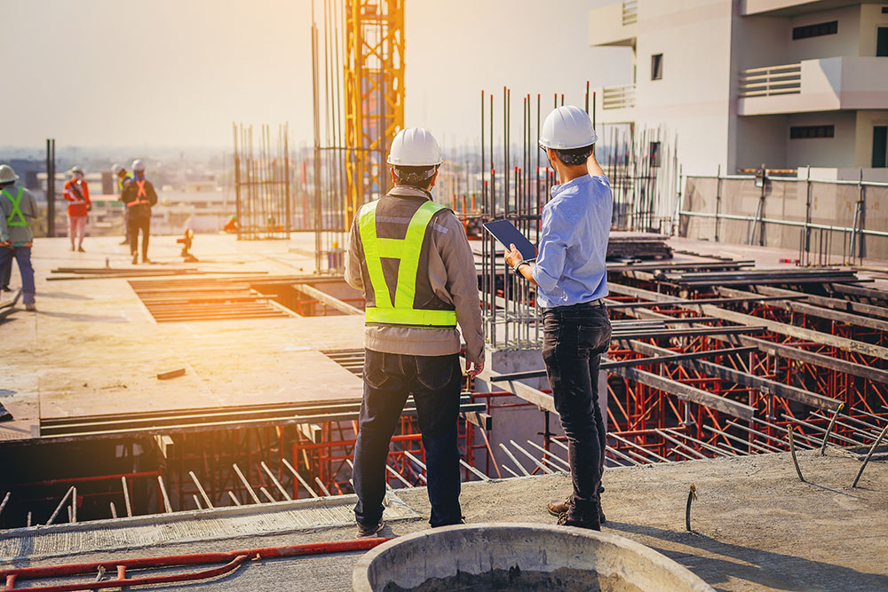 Engineer worker working outdoors building construction site